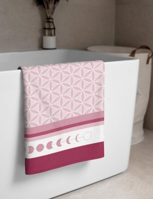 Flower Of Life and Moon Phase Travel Beach Towel Pink in the bathroom